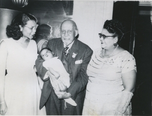 Photo: Du Bois with his daughter, granddaughter, and great-grandson